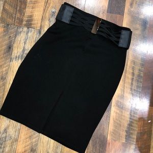 Black pencil skirt with slit and attached belt